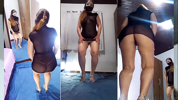 Spogliarsi, vestito nero trasparente e mutandine di cristallo