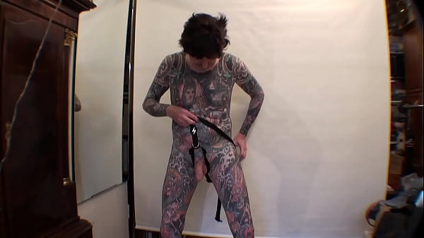 Tattoo Boy LeeHarper Pinnomen Show Off With a Borrowed Fancy Tight Beltstrap used in the Male Stripshow Production - Two Rings are Attached to the Strap - Enabling a Stripper With a P/A to Suspend His Penis Almost Resembling the Look of Aboriginals i